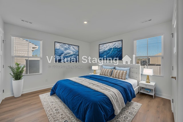 bedroom featuring hardwood / wood-style flooring