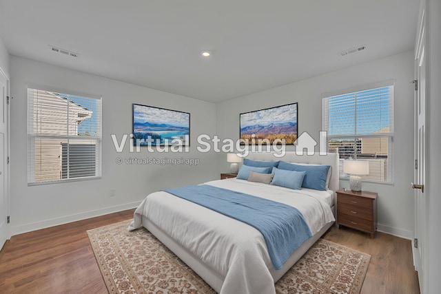 bedroom with wood-type flooring