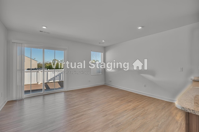 empty room featuring light hardwood / wood-style floors