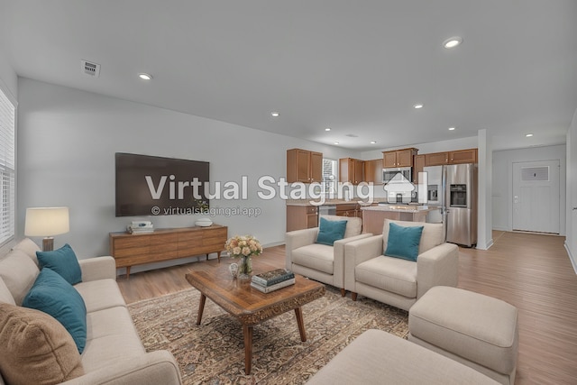 living room featuring light hardwood / wood-style floors