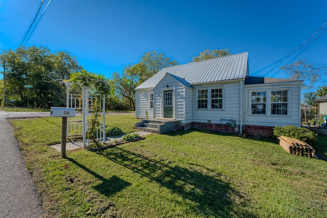 exterior space with a lawn