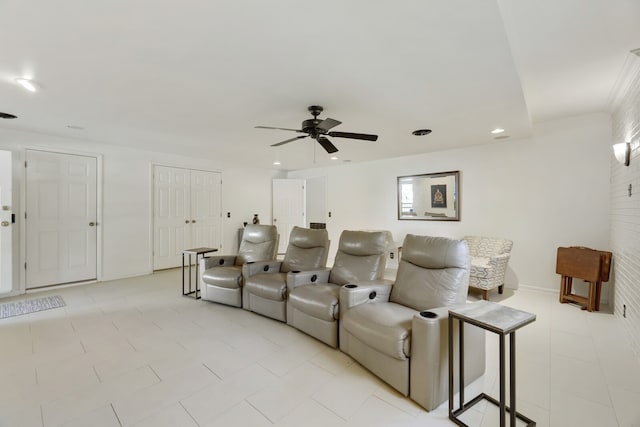 cinema room with ceiling fan