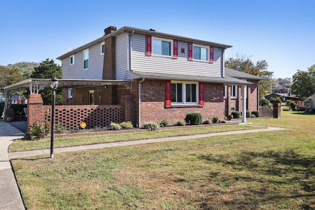 view of front property with a front lawn