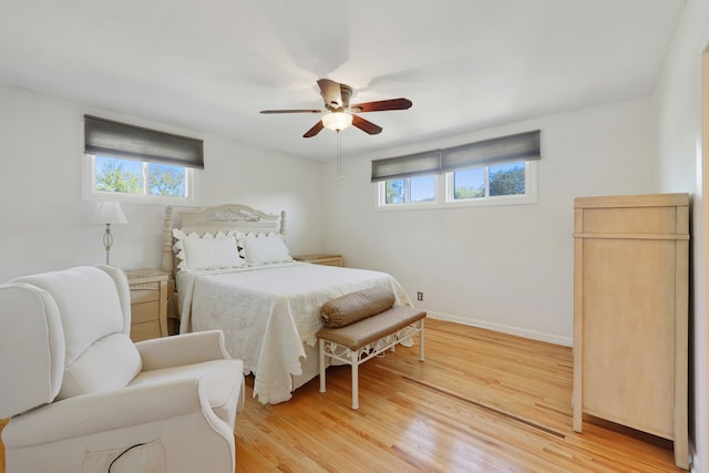 bedroom featuring ceiling fan and hardwood / wood-style floors