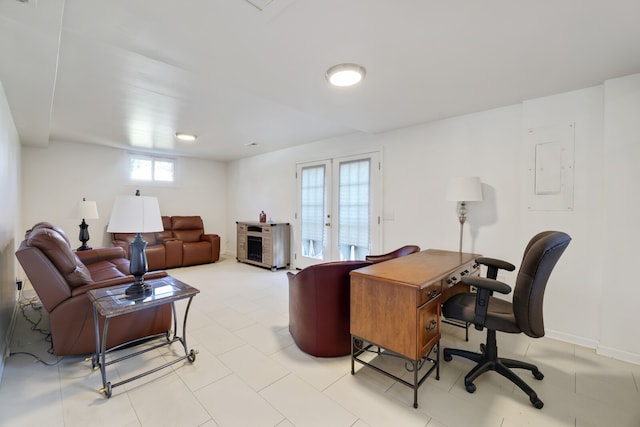 office area with french doors, light tile patterned flooring, and electric panel