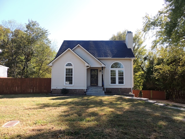 view of front of property with a front lawn