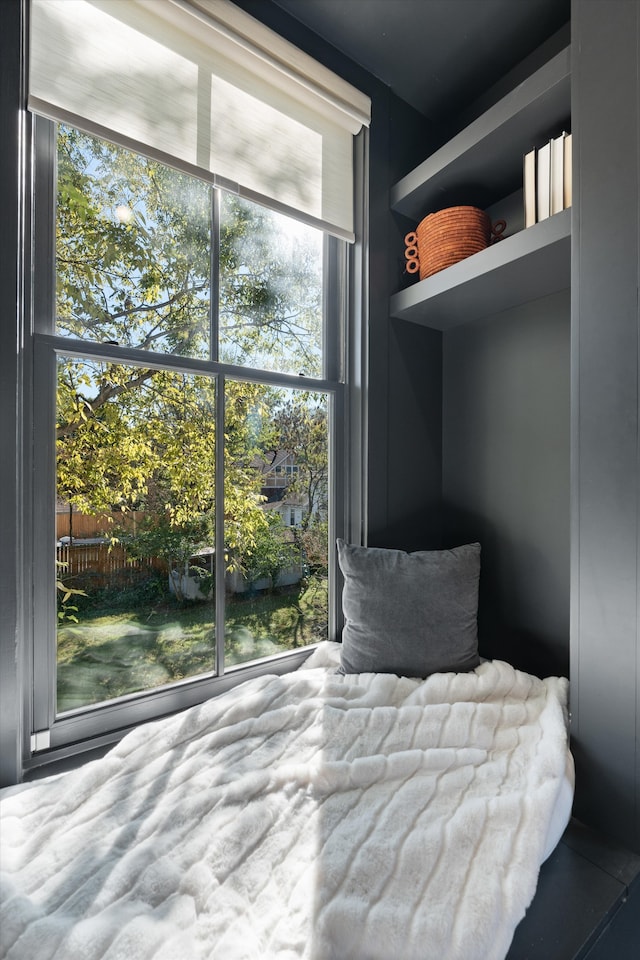 bedroom featuring expansive windows