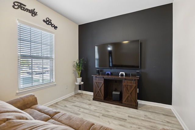 living room with light hardwood / wood-style flooring