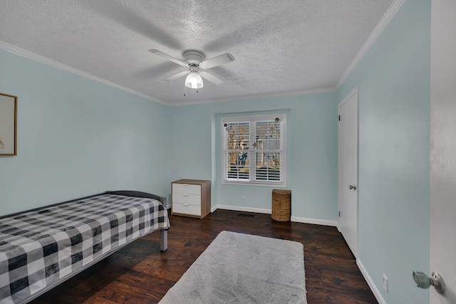 bedroom featuring a textured ceiling, ceiling fan, dark hardwood / wood-style floors, and crown molding