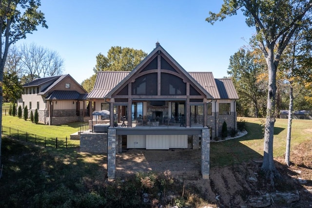 5893 Cairo Bend Rd, Lebanon, TN 37087 - back of property featuring stone siding, a standing seam roof, metal roof, and a balcony