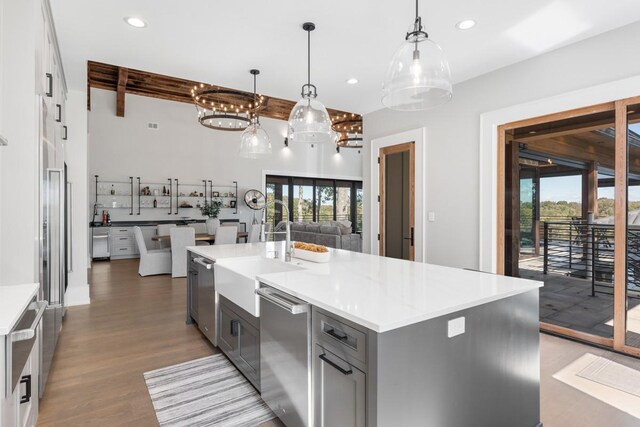5893 Cairo Bend Rd, Lebanon, TN 37087 - kitchen featuring a sink, dishwasher, gray cabinets, plenty of natural light, and beam ceiling