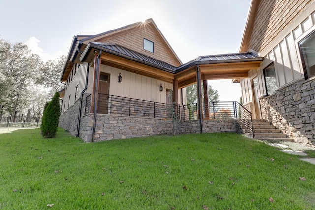 5893 Cairo Bend Rd, Lebanon, TN 37087 - view of side of property with a standing seam roof, metal roof, and stone siding