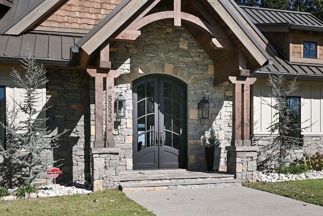 5893 Cairo Bend Rd, Lebanon, TN 37087 - doorway to property with a standing seam roof, stone siding, french doors, and metal roof