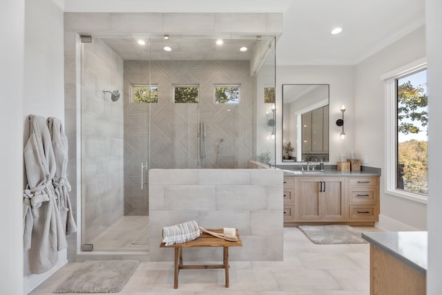 bathroom featuring vanity, tile patterned flooring, and an enclosed shower