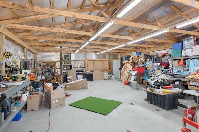 5893 Cairo Bend Rd, Lebanon, TN 37087 - miscellaneous room featuring unfinished concrete flooring and a workshop area
