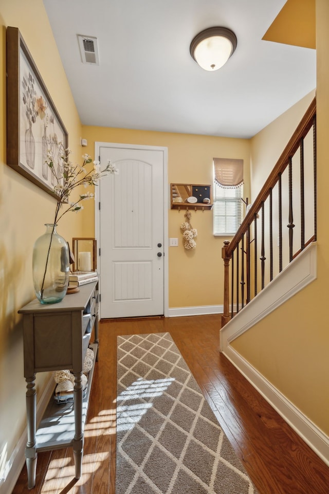 entryway featuring dark hardwood / wood-style floors