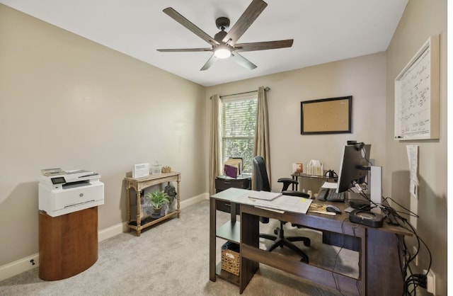 office space featuring light colored carpet and ceiling fan