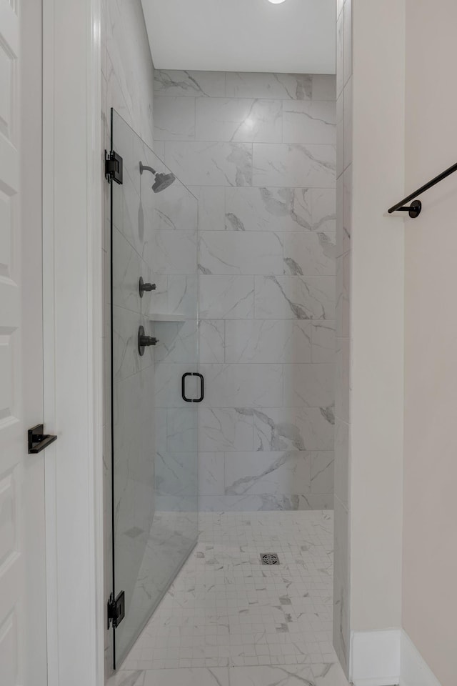 bathroom featuring a stall shower