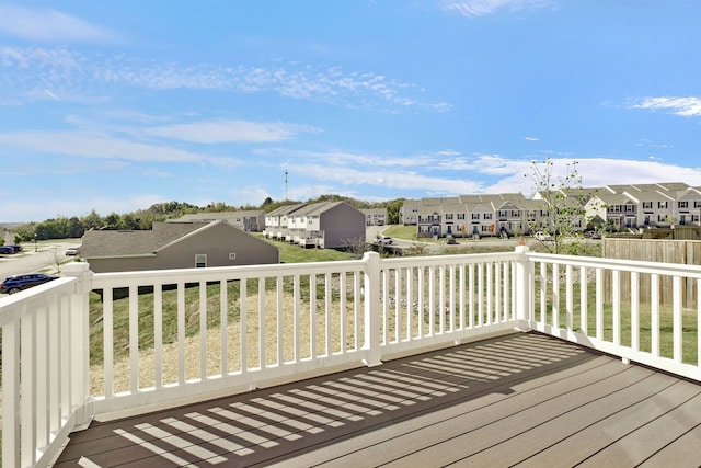 wooden terrace with a yard