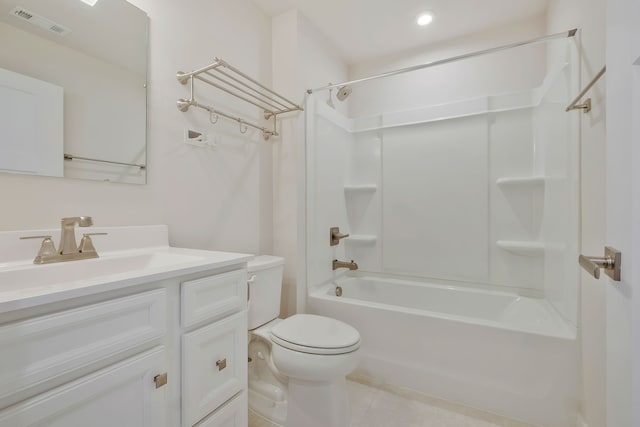 full bathroom featuring vanity, shower / bath combination, tile patterned floors, and toilet