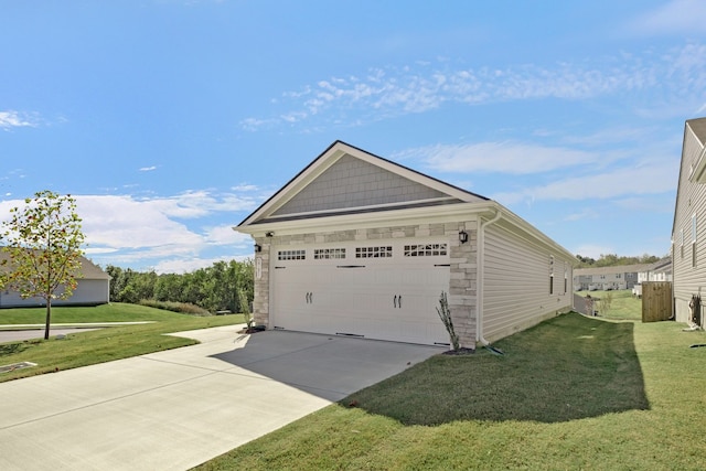 garage featuring a lawn