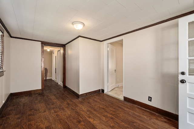 empty room featuring dark hardwood / wood-style flooring