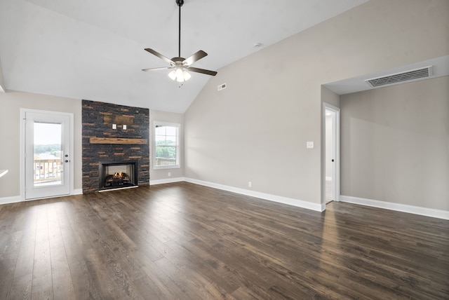 unfurnished living room featuring ceiling fan, dark wood-type flooring, high vaulted ceiling, and a fireplace