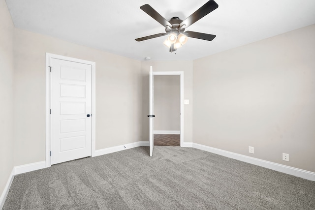 unfurnished bedroom with ceiling fan and carpet flooring