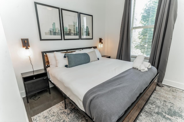 210 30th Ave N Unit 209, Nashville, TN 37203 - bedroom featuring baseboards