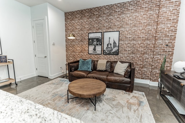 living room with brick wall