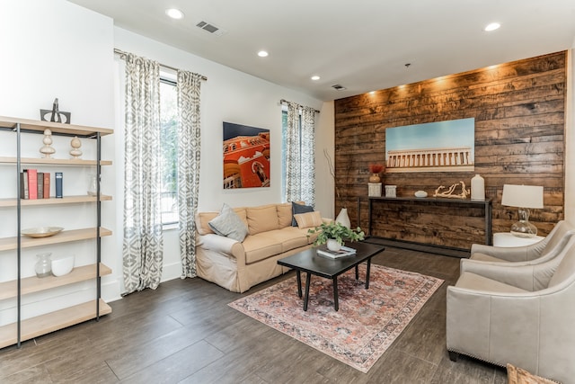 living room featuring dark wood-type flooring