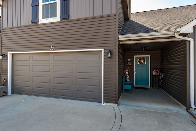 entrance to property featuring a garage