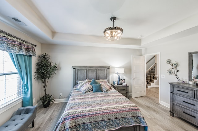 bedroom featuring light wood-type flooring