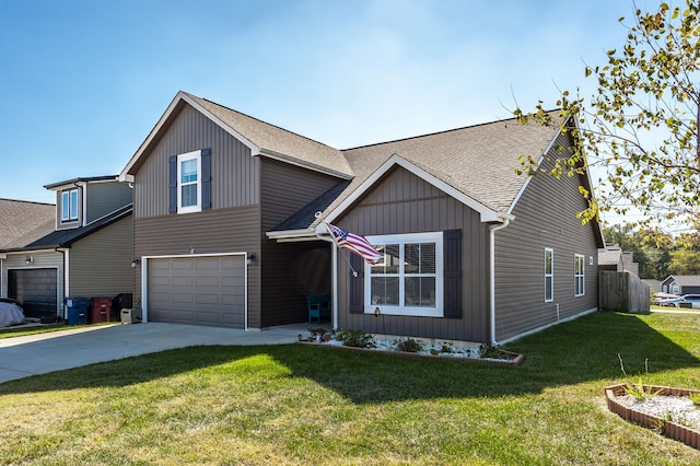 view of front of home featuring a front lawn and a garage