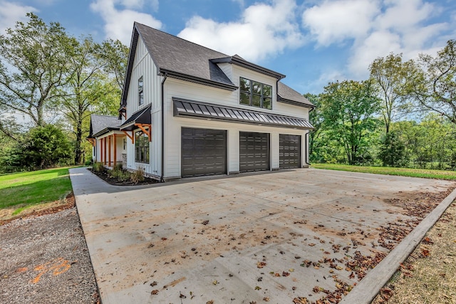 view of side of home with a garage