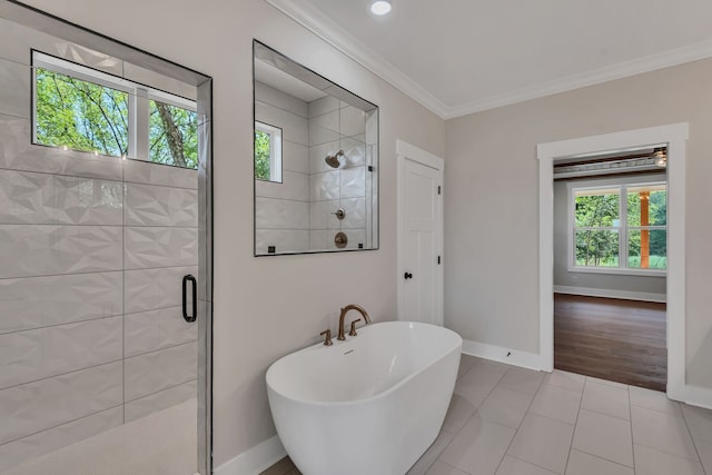 bathroom with crown molding, shower with separate bathtub, and wood-type flooring