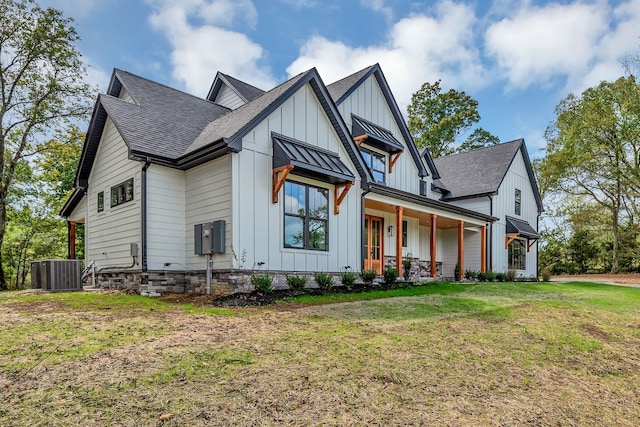 modern farmhouse with central AC and a front lawn