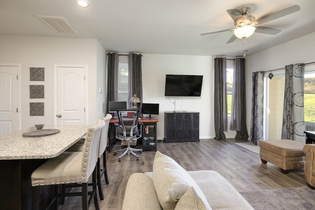 home office with ceiling fan and wood-type flooring