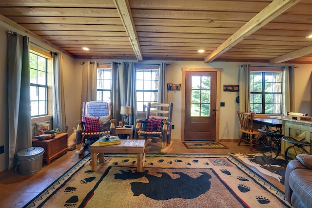 living area featuring beam ceiling, tile patterned floors, and wooden ceiling