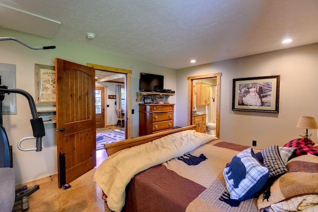 609 Whitthorne St, Shelbyville, TN 37160 - carpeted bedroom with recessed lighting and ensuite bathroom