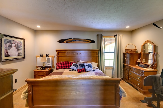 bedroom with a textured ceiling