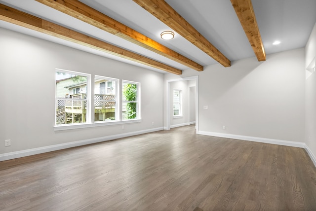 interior space featuring hardwood / wood-style flooring and beam ceiling