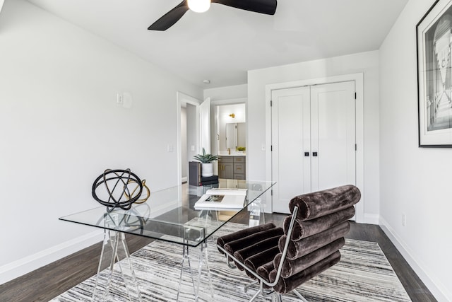 office area featuring ceiling fan and dark hardwood / wood-style floors