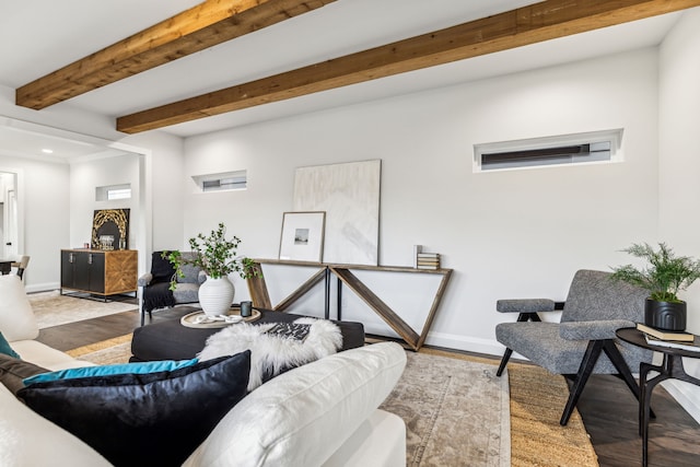 living room featuring light hardwood / wood-style flooring and beam ceiling