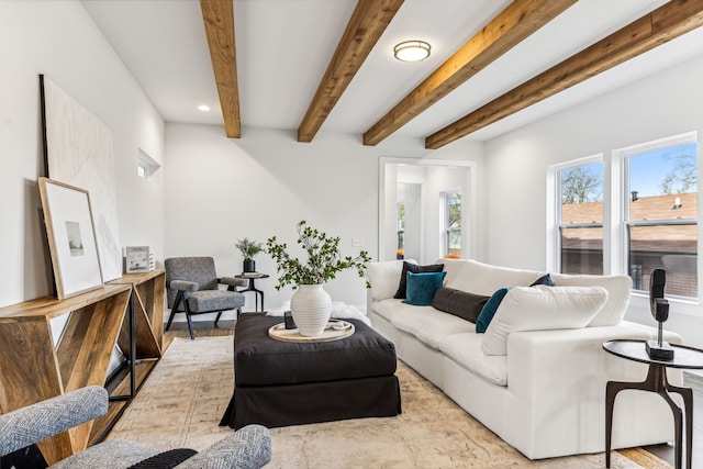 living room featuring beam ceiling