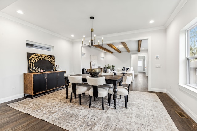 dining space featuring ornamental molding, beamed ceiling, a chandelier, and dark hardwood / wood-style floors