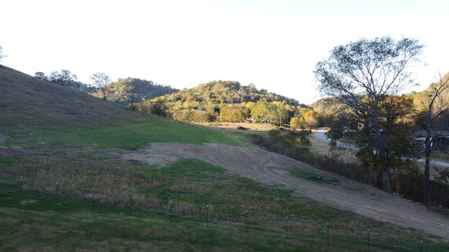 exterior space featuring a rural view and a mountain view