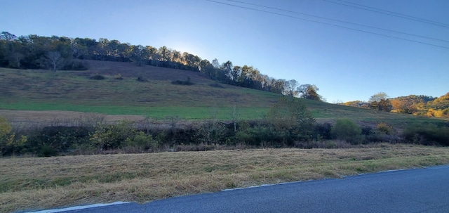 view of mountain feature with a rural view