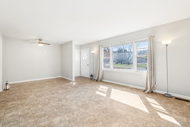 unfurnished room featuring ceiling fan