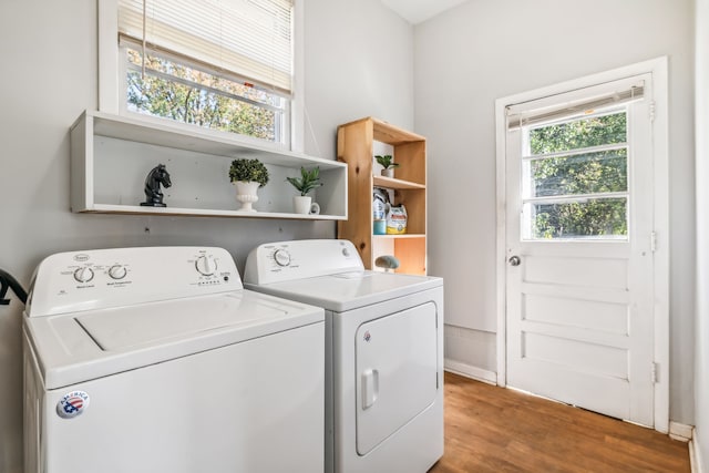 washroom featuring hardwood / wood-style floors and independent washer and dryer